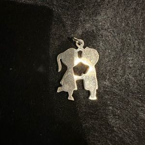 💋 Vintage 70s silver kissing girl and boy pendant.